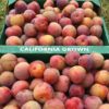 California grown organic plums in a box
